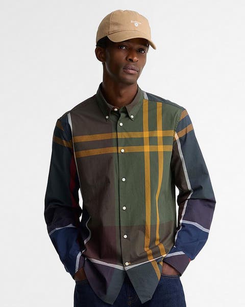 A man wearing plaid shirt.