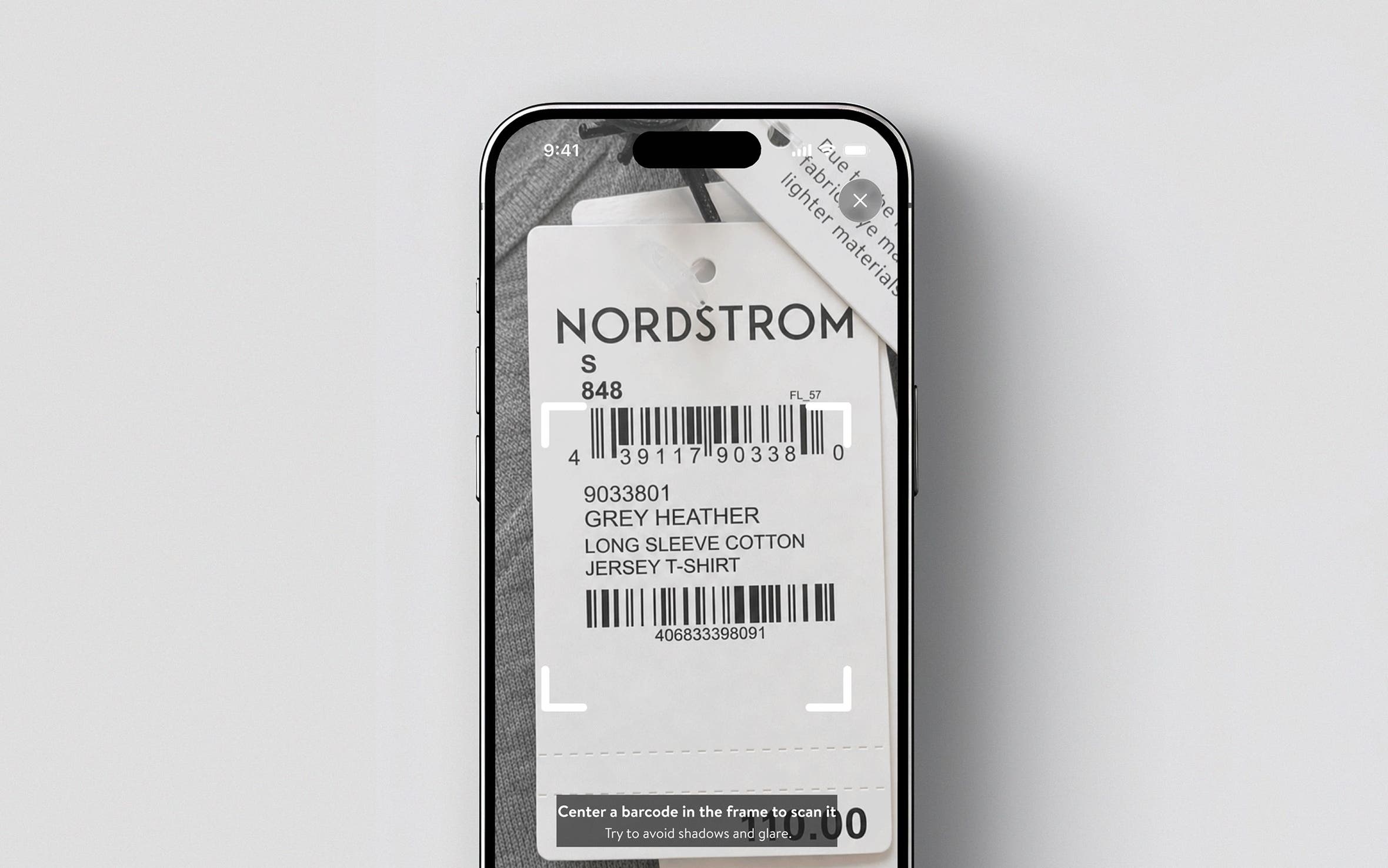 Phone screen showing a clothing tag.