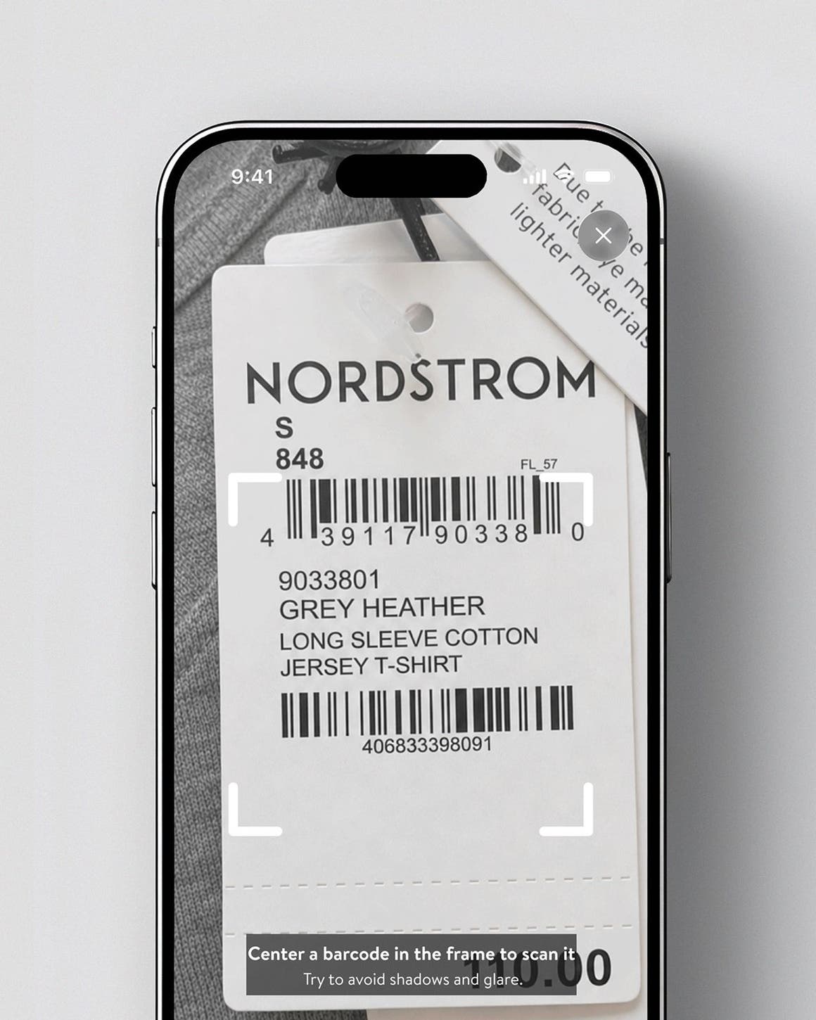 Phone screen showing a clothing tag.