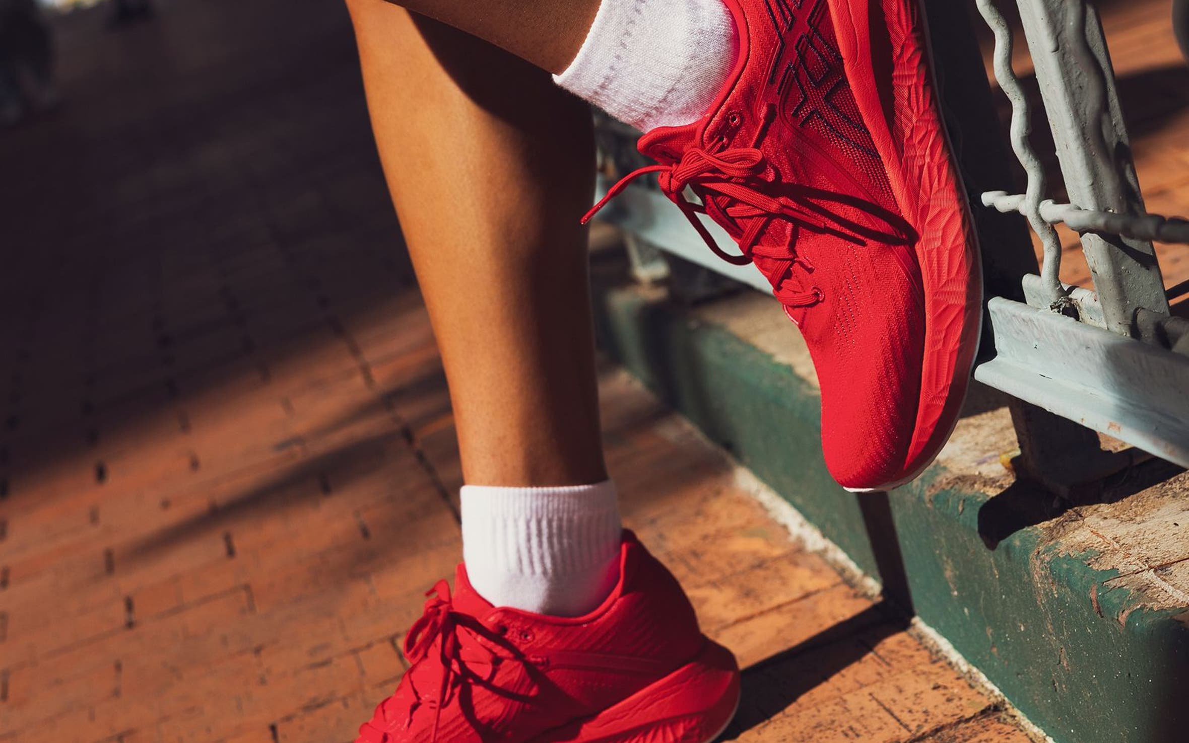 ASICS® sneakers.
