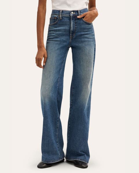 A woman wearing a pair of denim jeans.