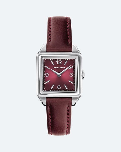 A burgundy Movado watch.