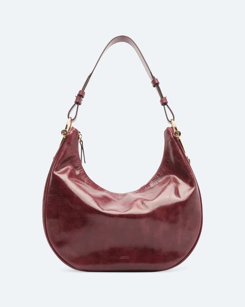 Burgundy leather slouchy hobo bag with gold hardware.