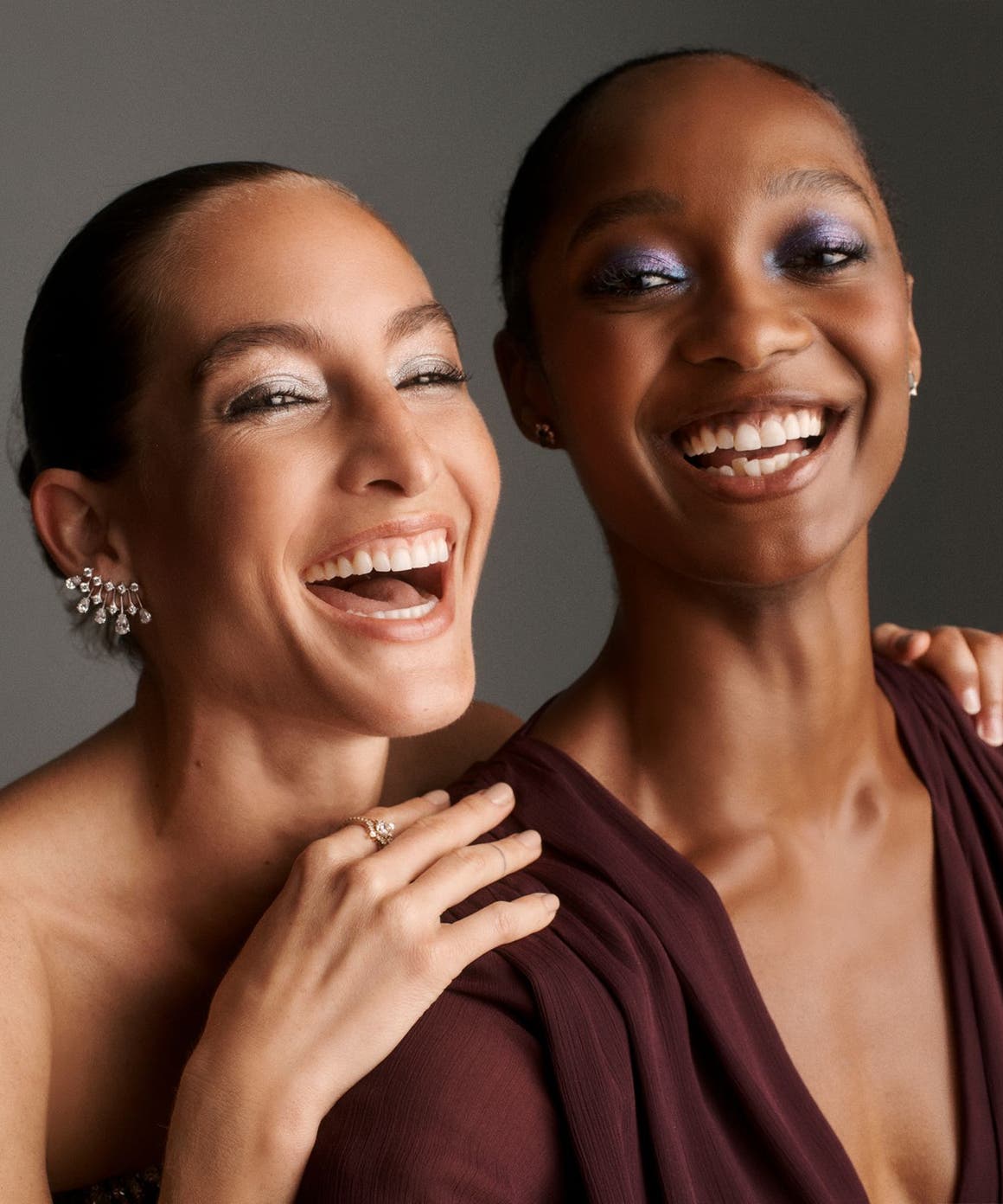 Two women smiling.