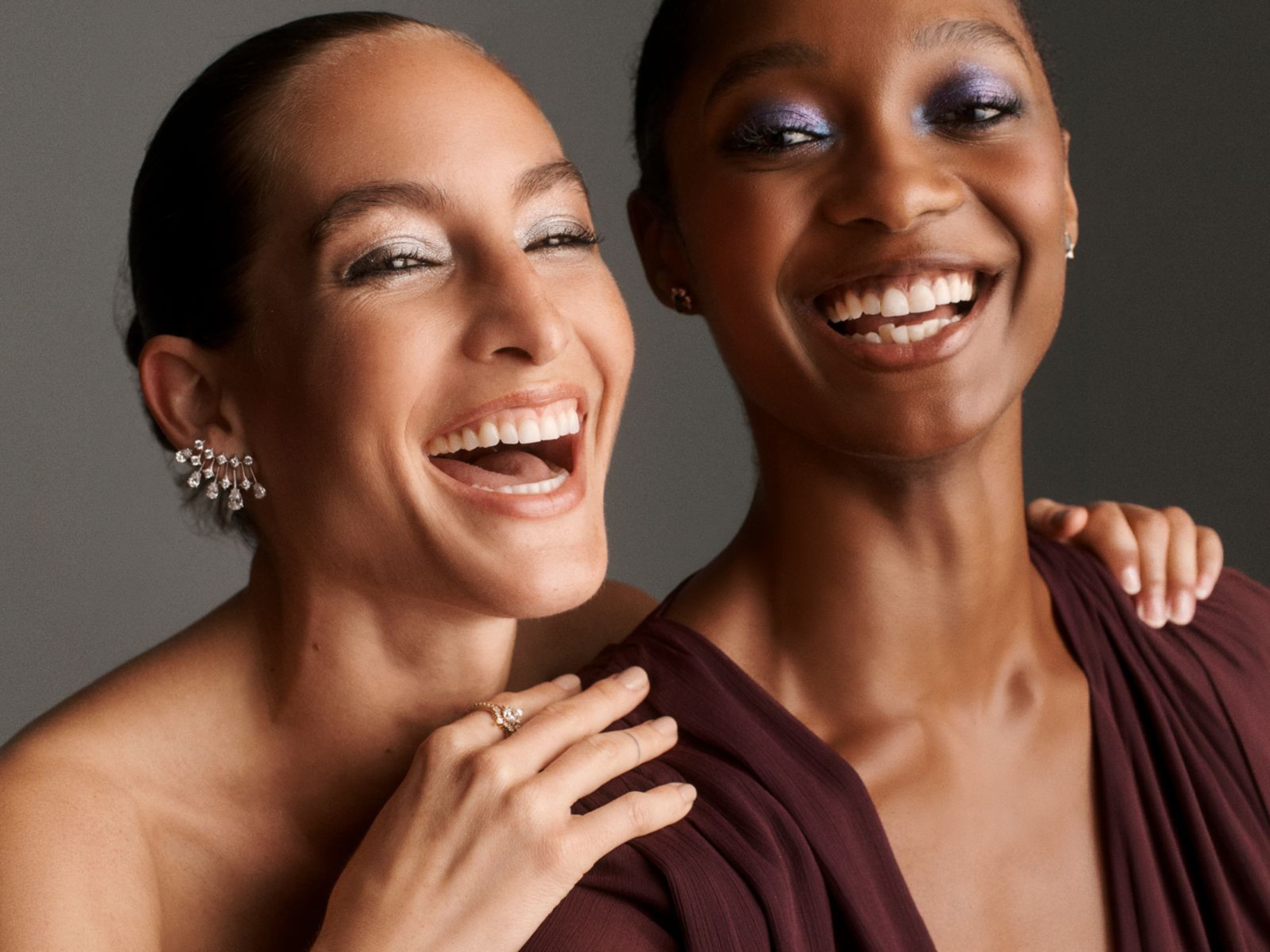 Two women smiling.