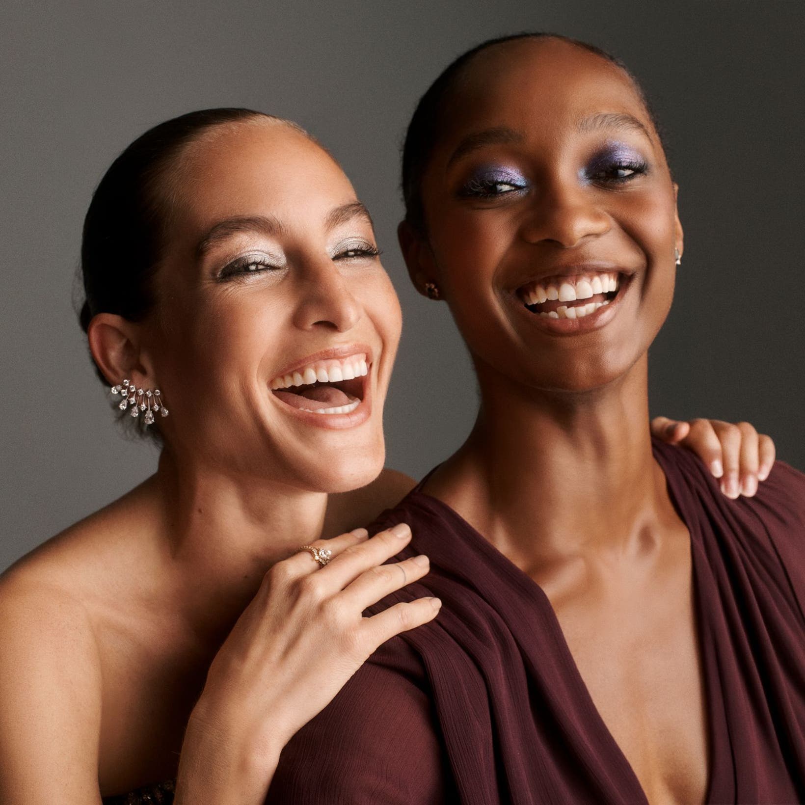 Two women smiling.