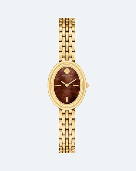 A gold Tory Burch watch.