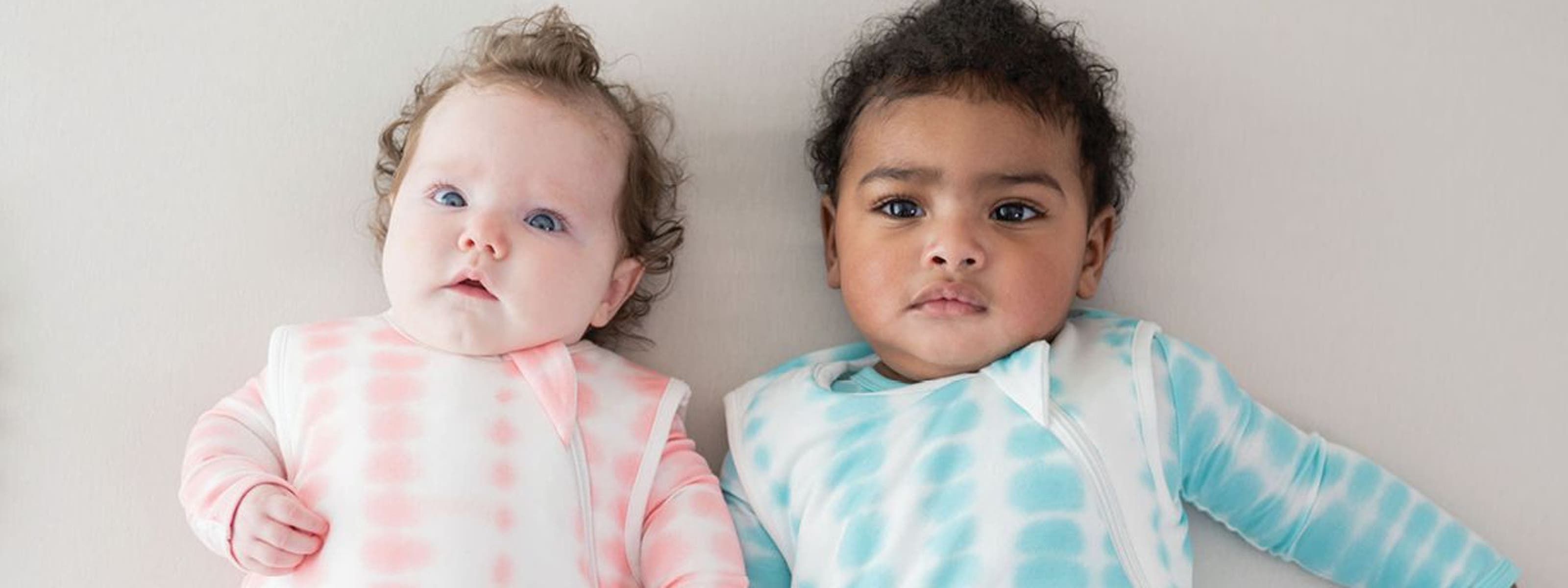 Two babies laying down.