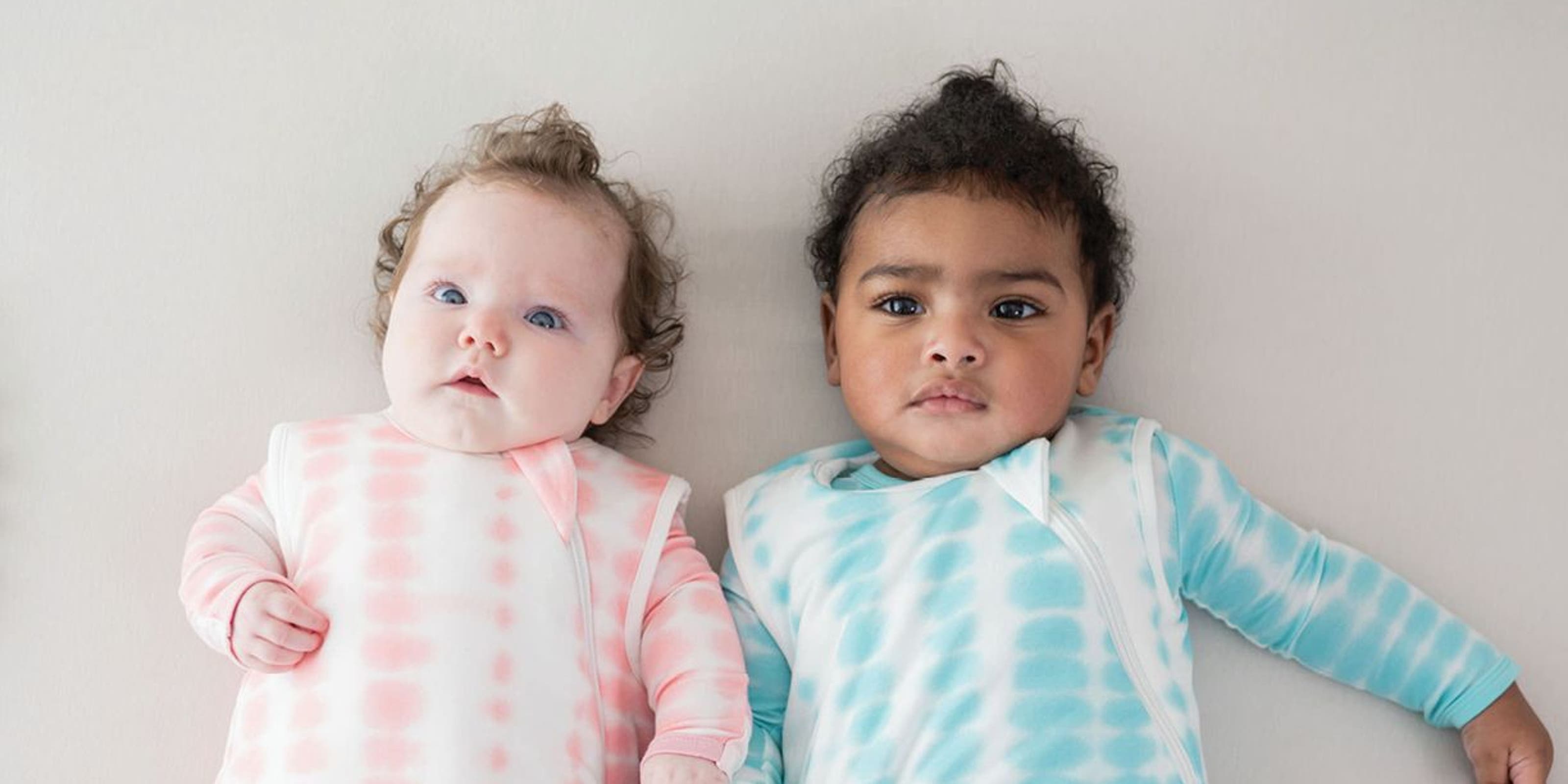 Two babies laying down.