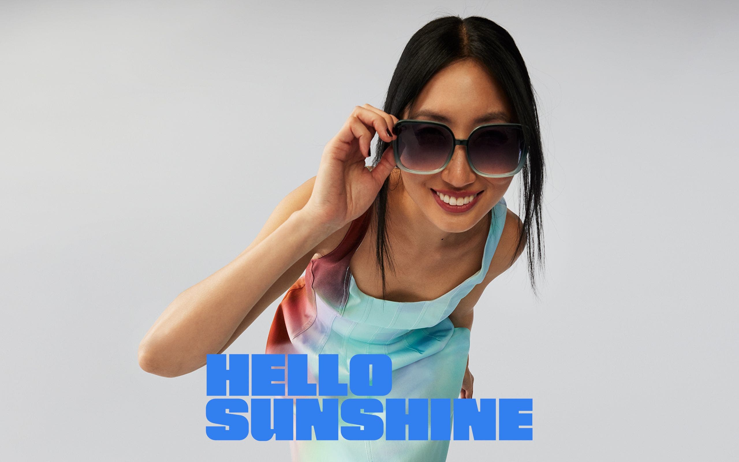 Woman wearing designer sunglasses.