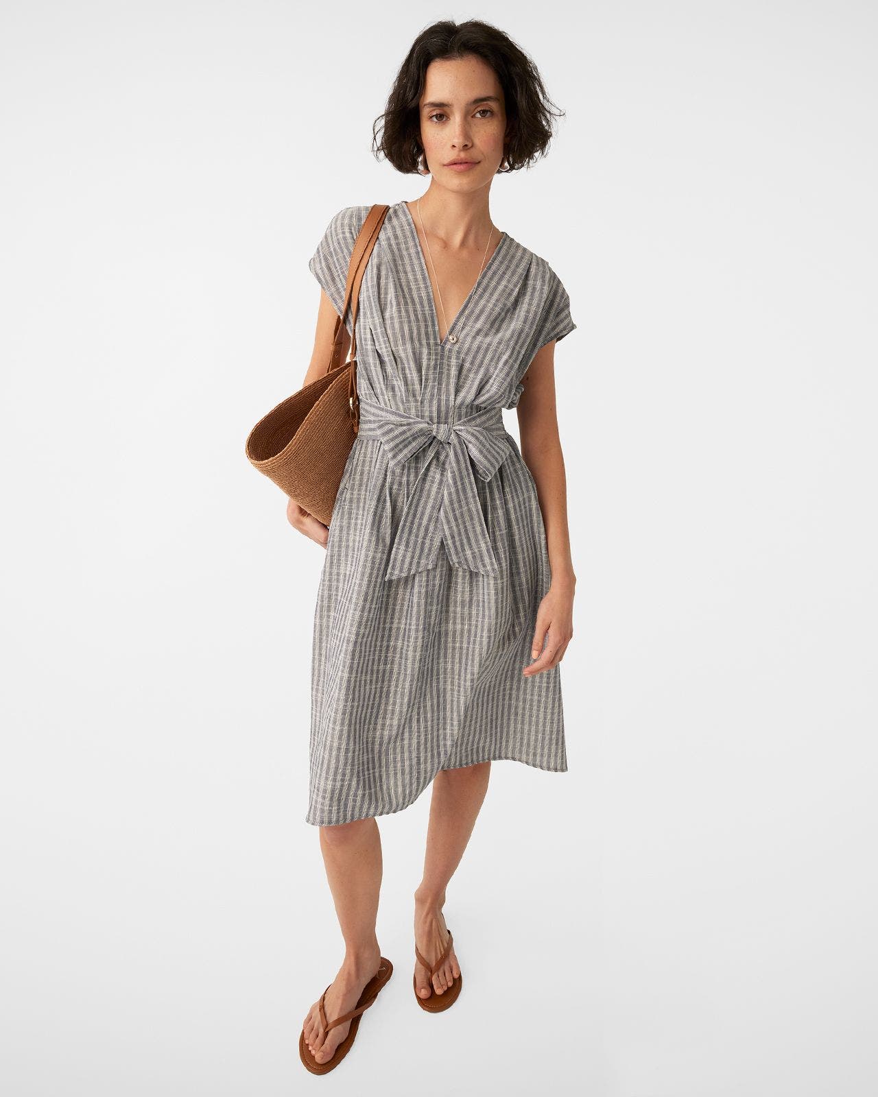 A woman wearing a dress.