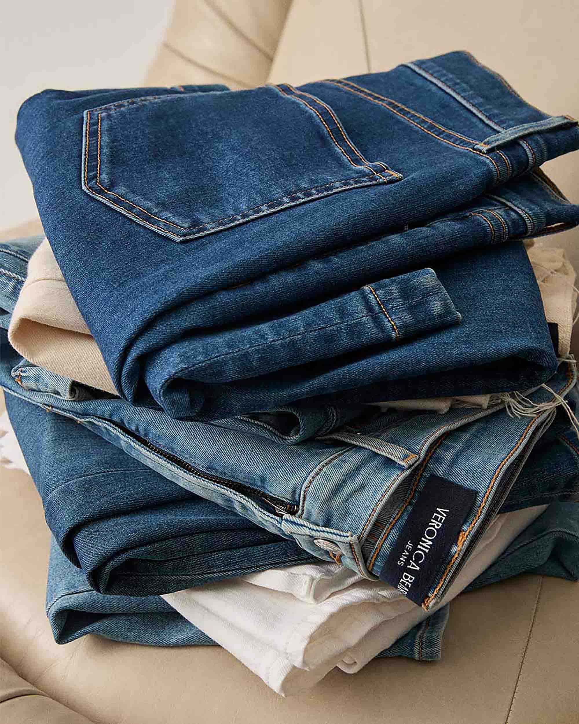 A stack of Veronica Beard jeans.	