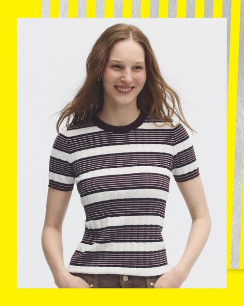 A woman wearing a striped t-shirt.