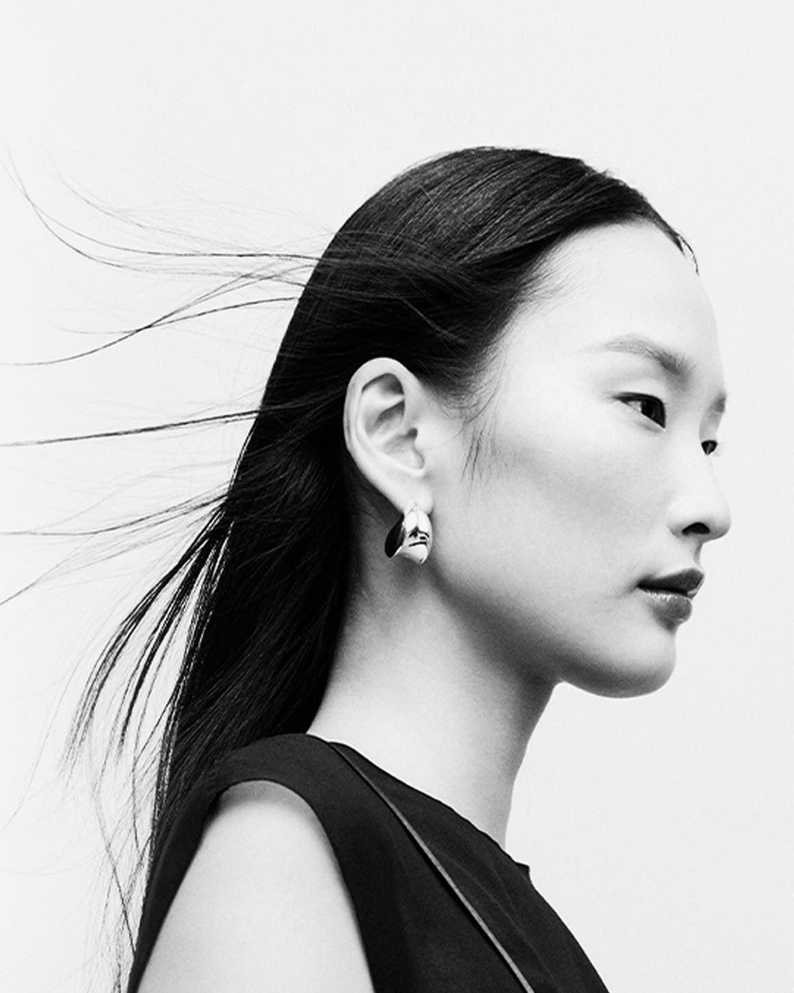 Woman wearing designer pieces.