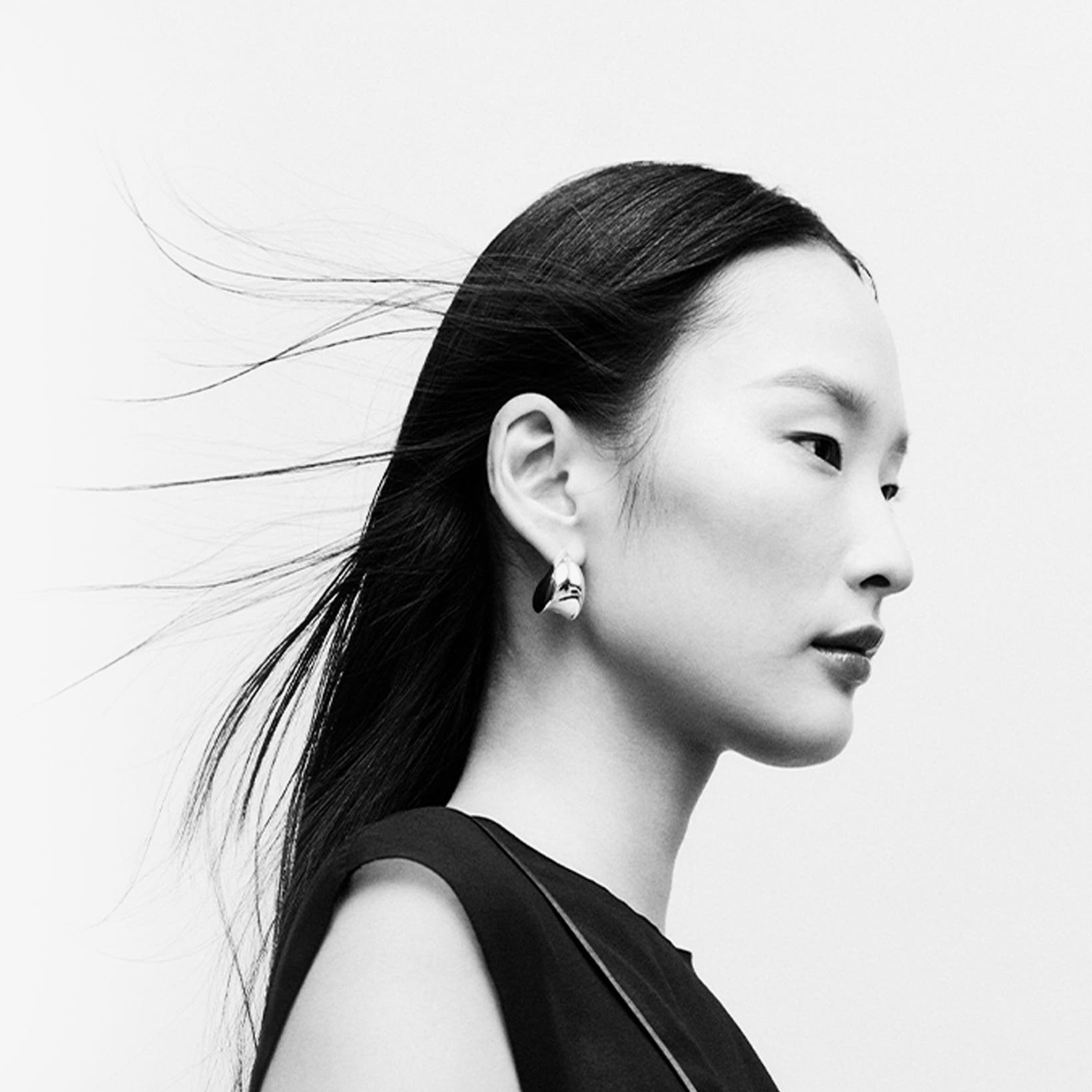 Woman wearing designer pieces.