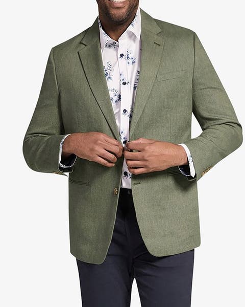 A man wearing a green sport coat in a big and tall size.