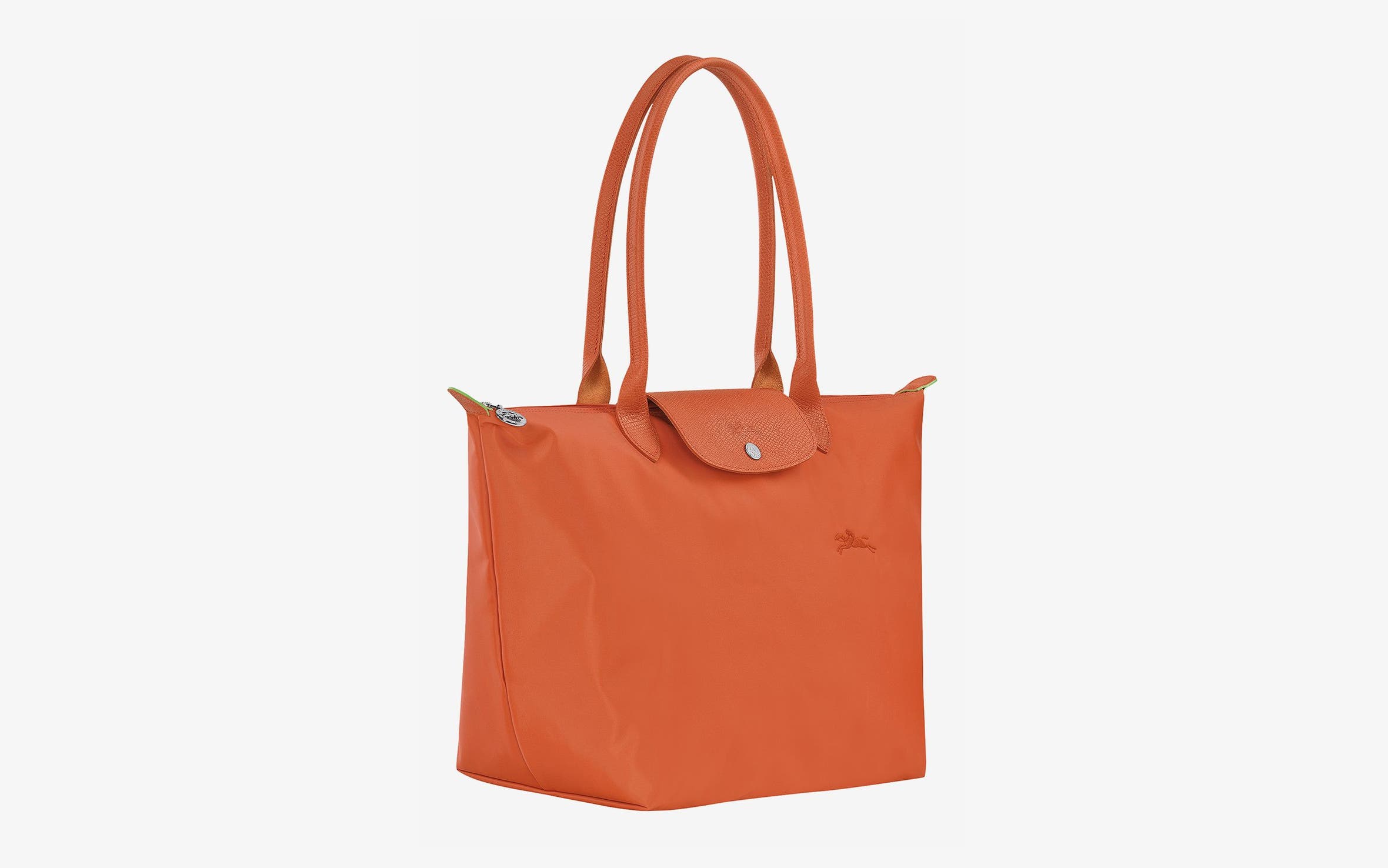 An orange tote from Longchamp.