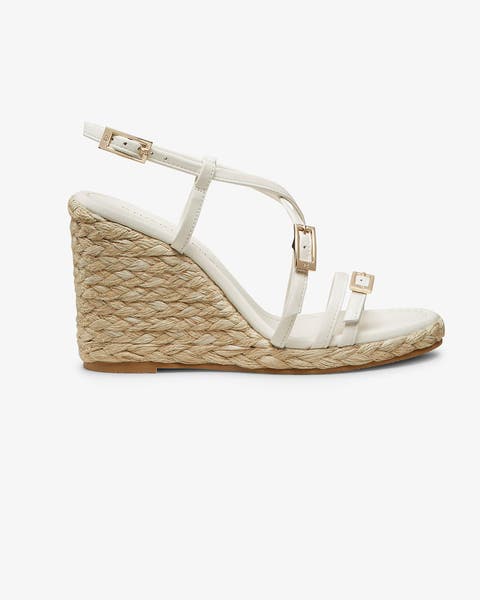 White espadrille wedge sandals.