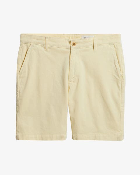 Beige shorts.