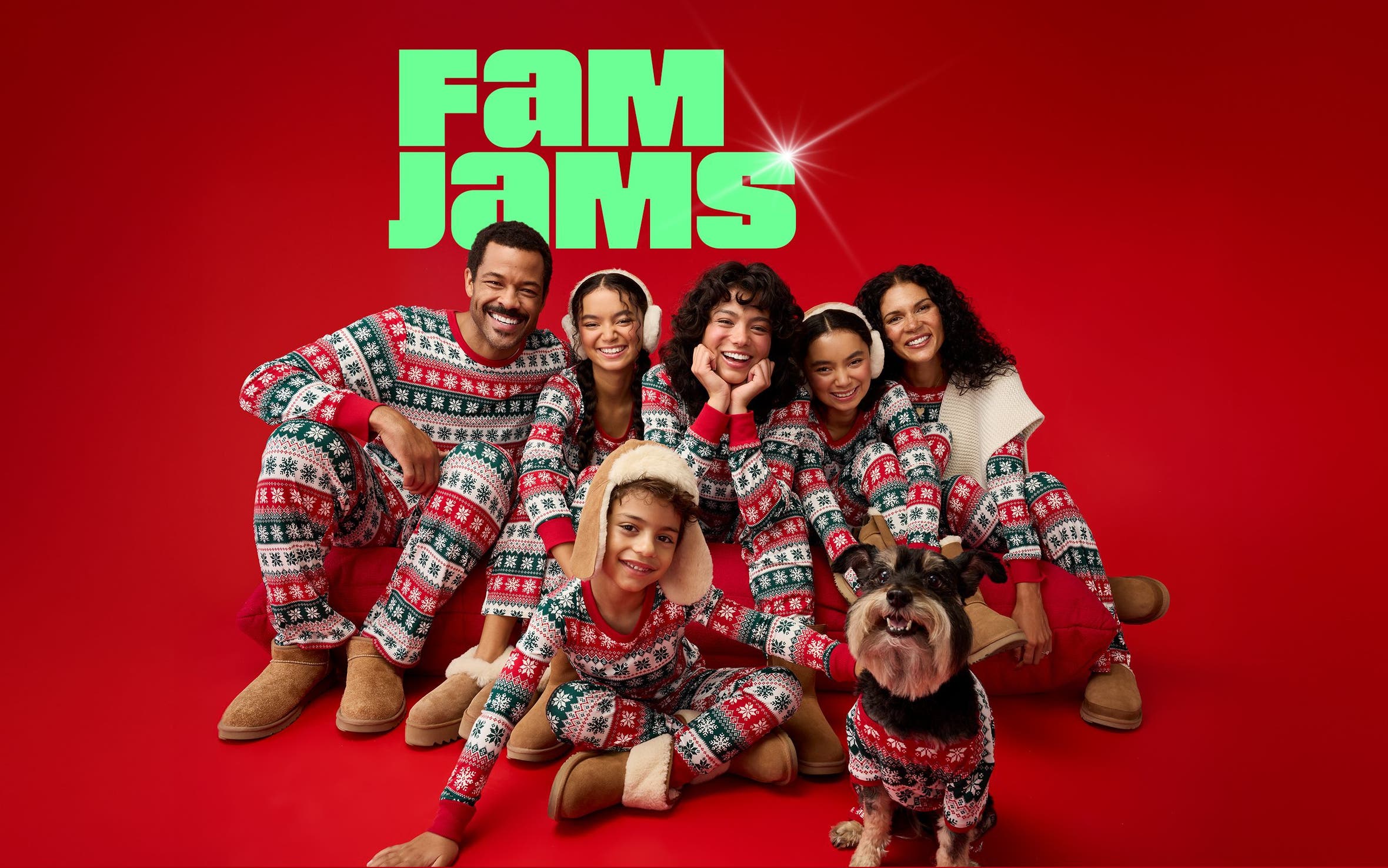 A family wearing matching pajamas.