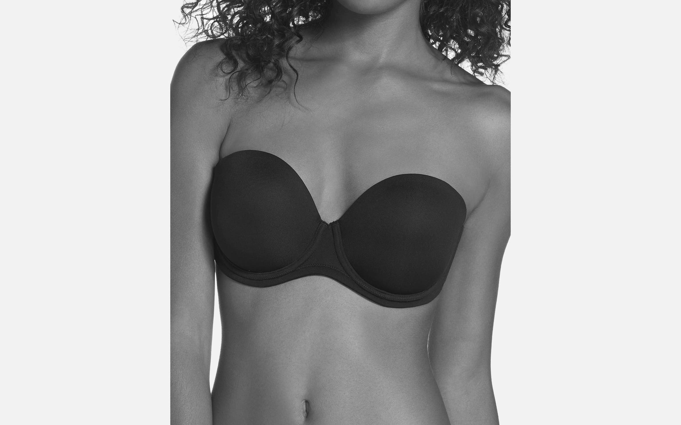 A woman in a strapless bra.