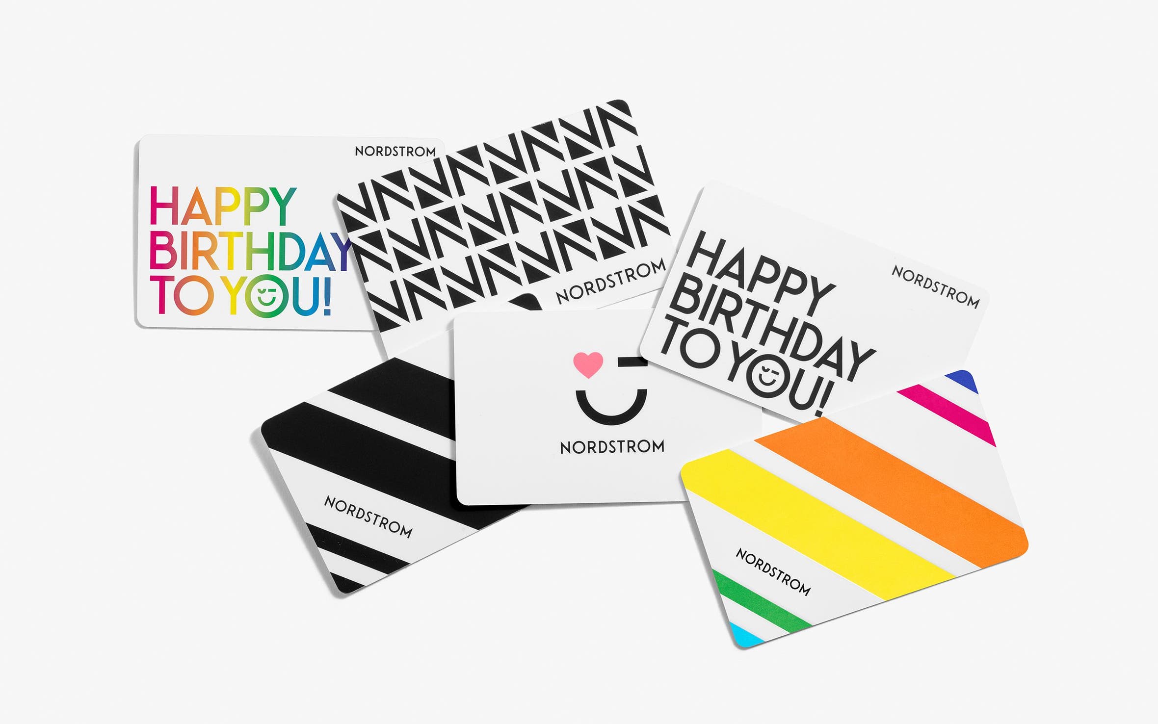 A selection of Nordstrom gift cards in a variety of designs.