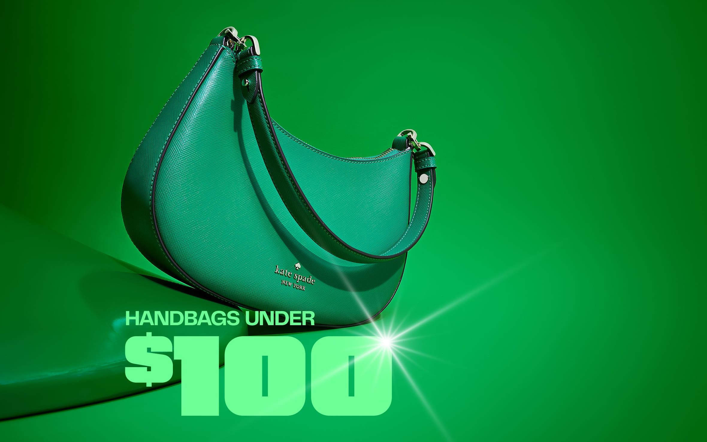 A green Kate Spade New York shoulder bag.