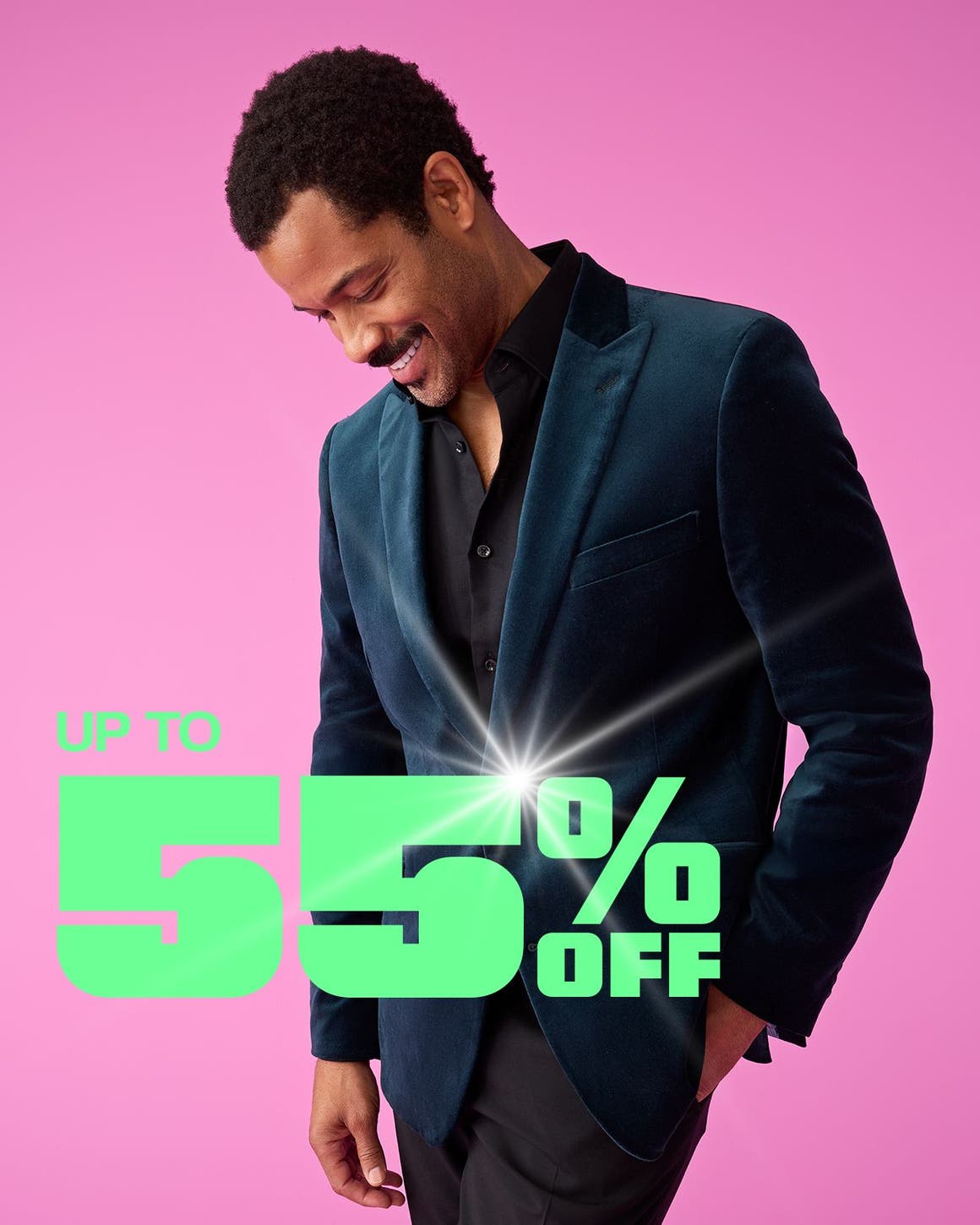 A man wearing a blue suit coat.