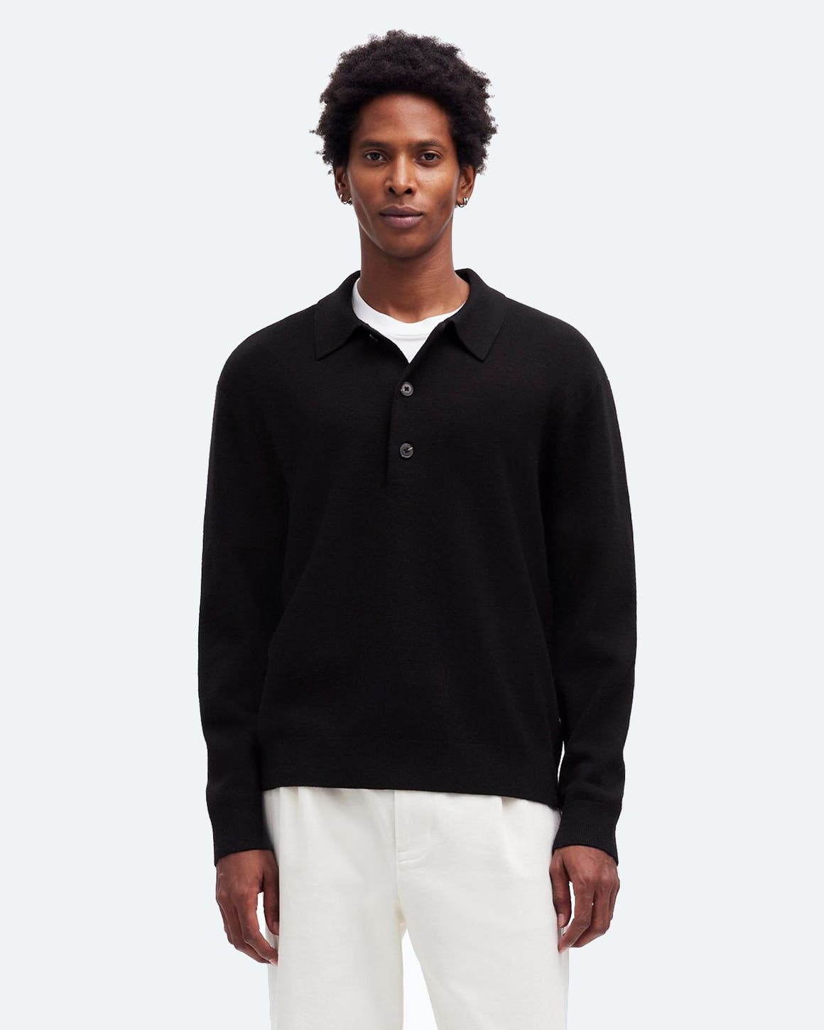 A man in a blue Madewell sweater.