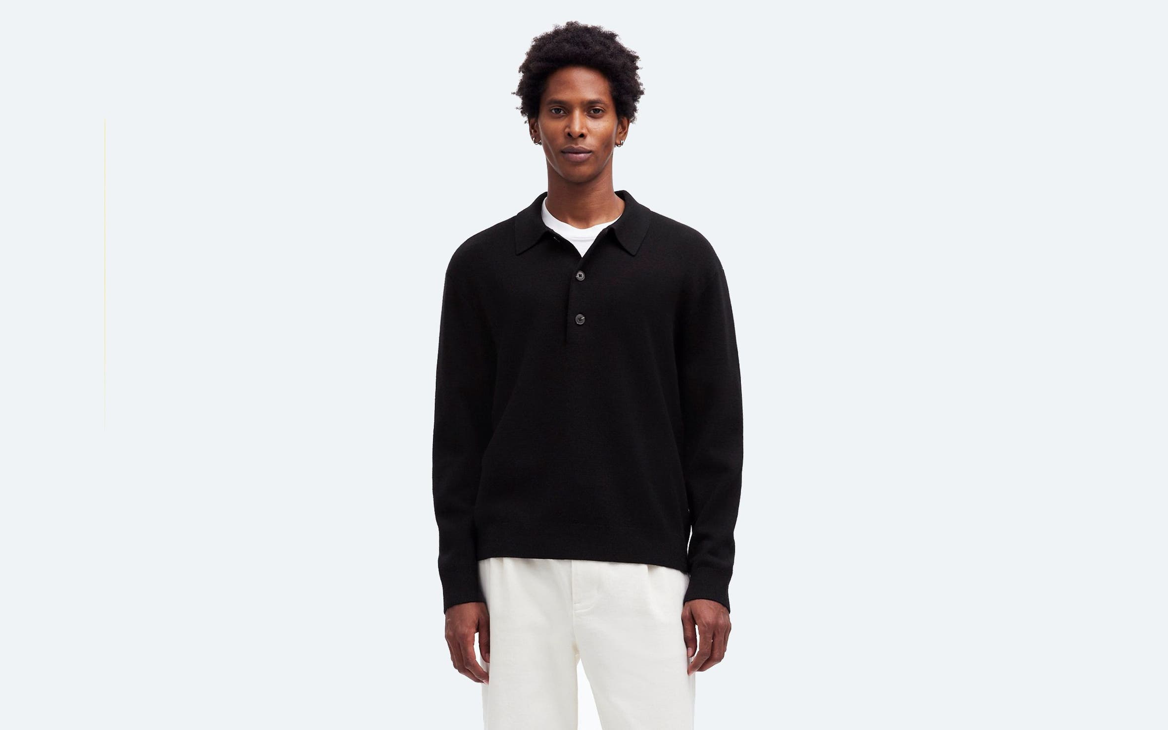 A man in a blue Madewell sweater.