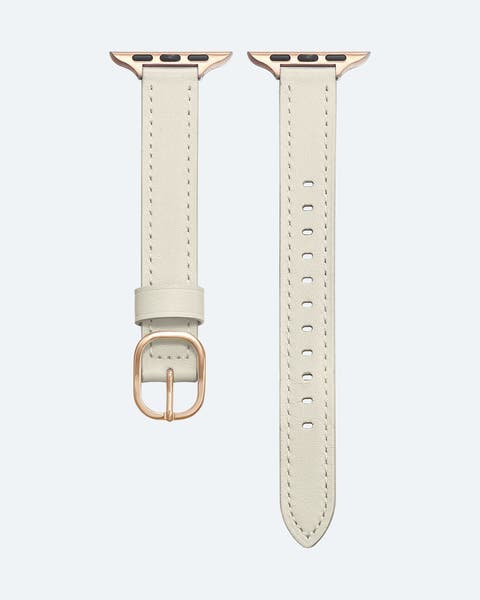A cream watch strap. 