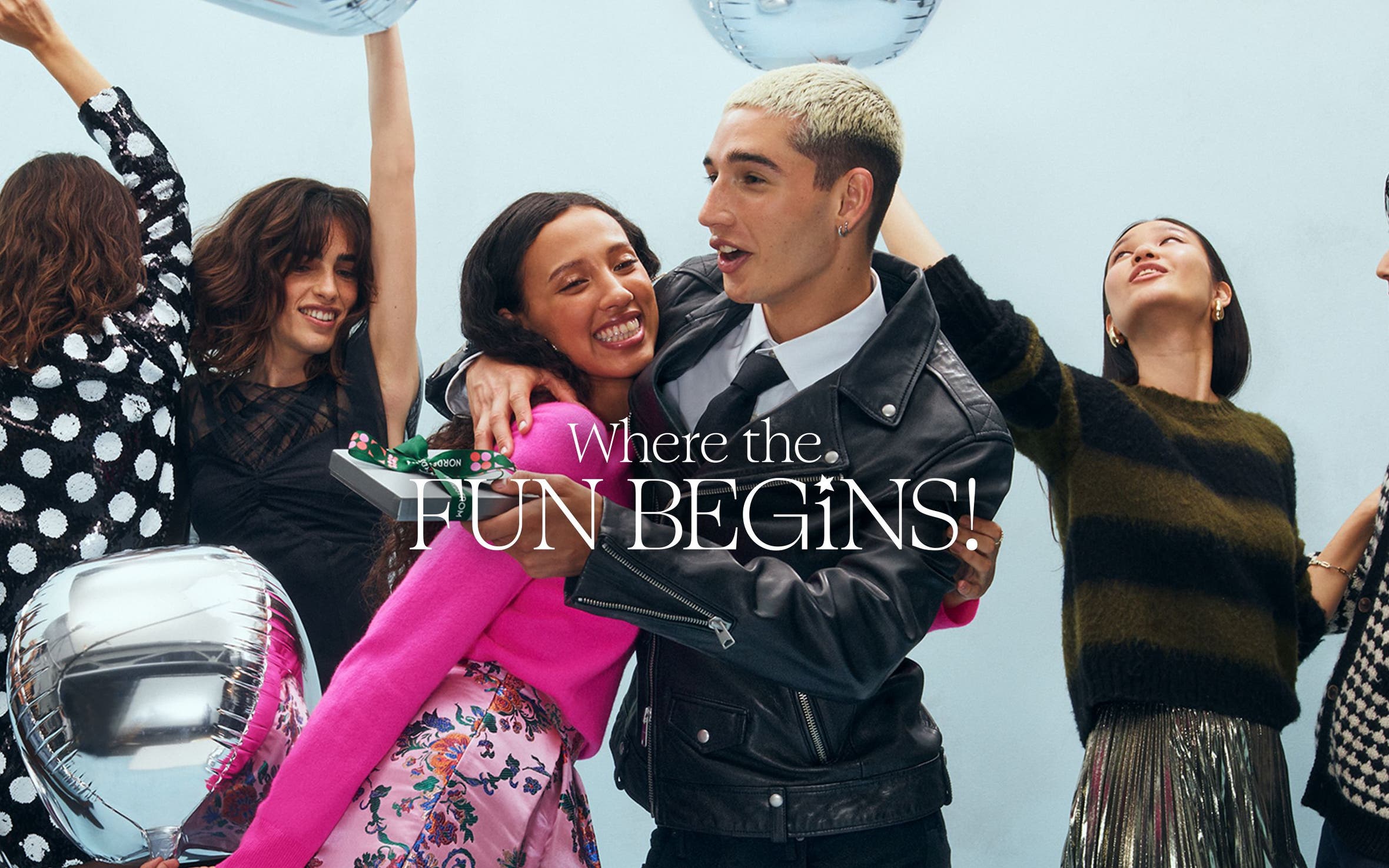 Beautifully dressed partygoers.