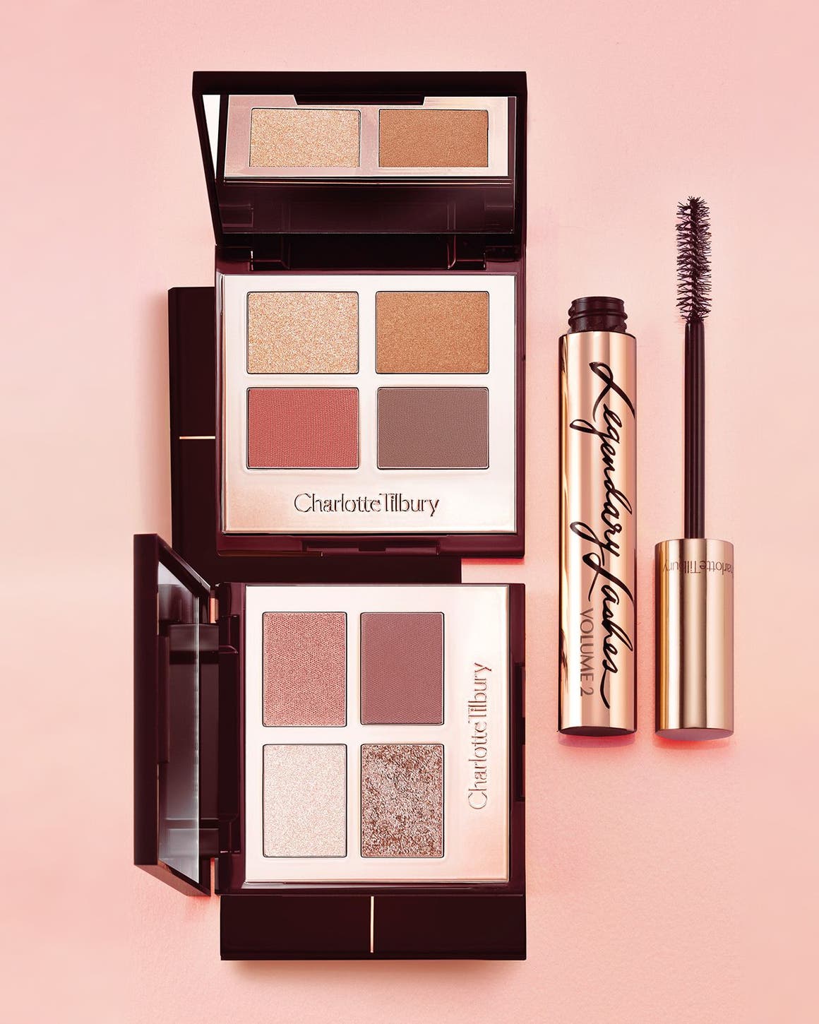 Charlotte Tilbury eyeshadow palettes and mascara.