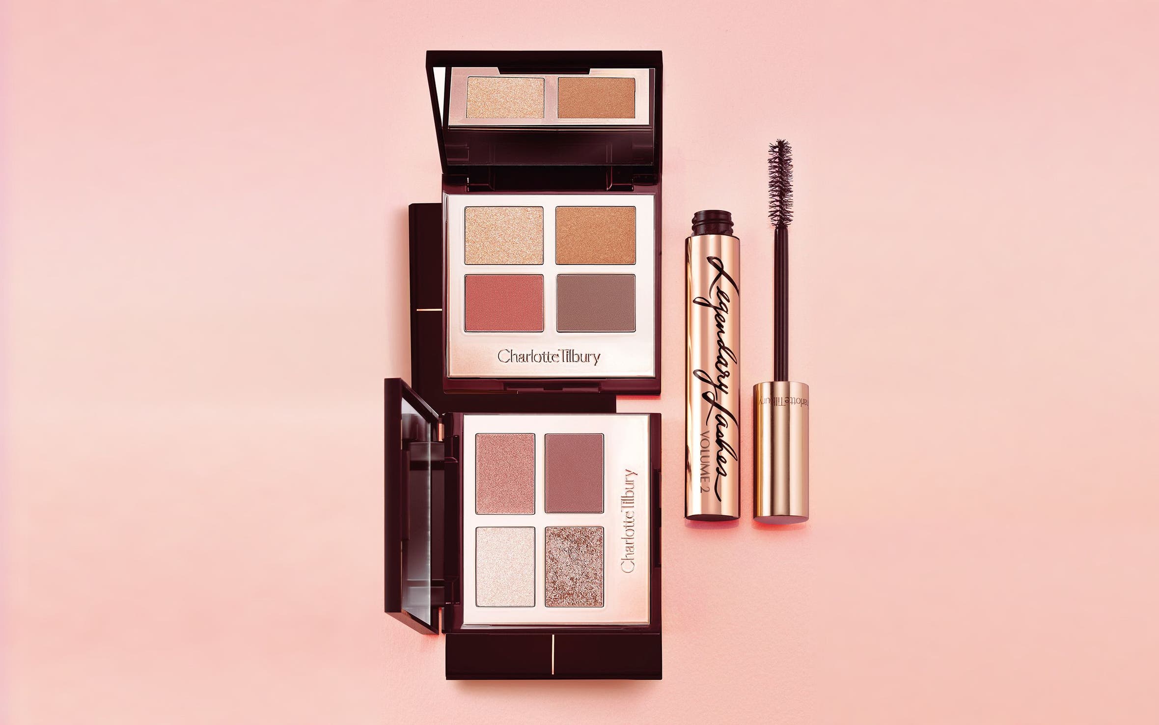 Charlotte Tilbury eyeshadow palettes and mascara.