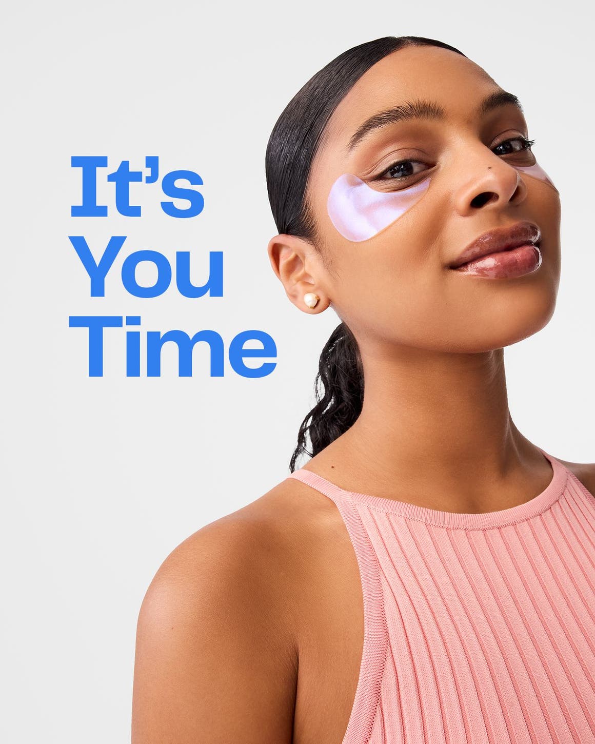 A woman wearing undereye masks.