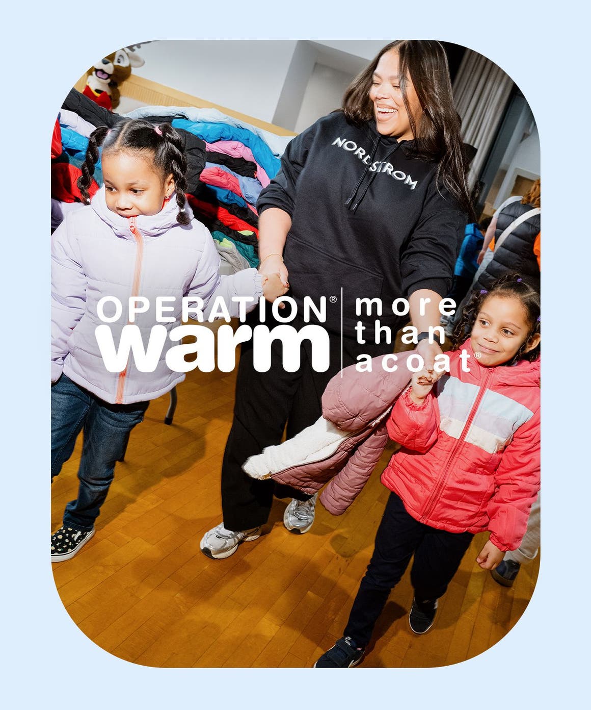 Kids wearing their new coats.