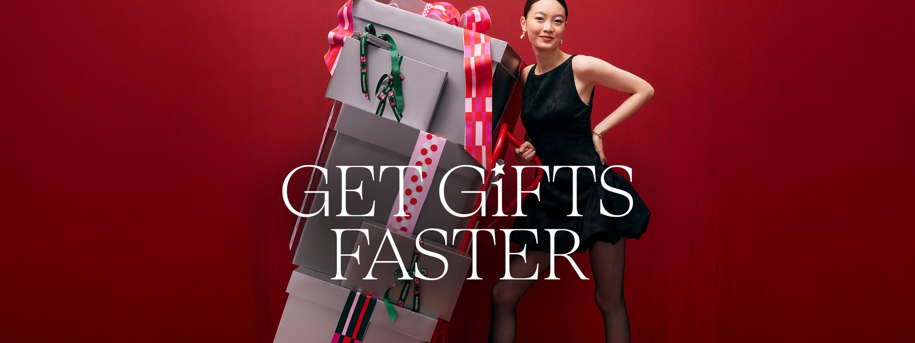 Get gifts faster. A woman with a stack of gift boxes. 