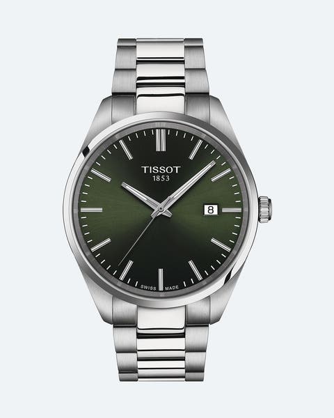 A watch with a green face.