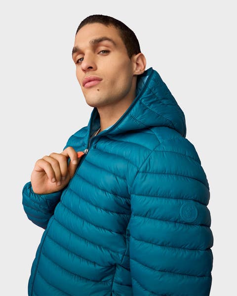 A man wearing a puffer jacket.