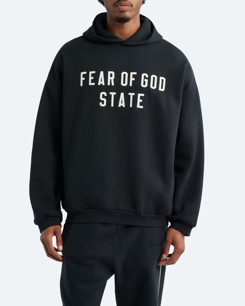 Man wearing a hoodie.