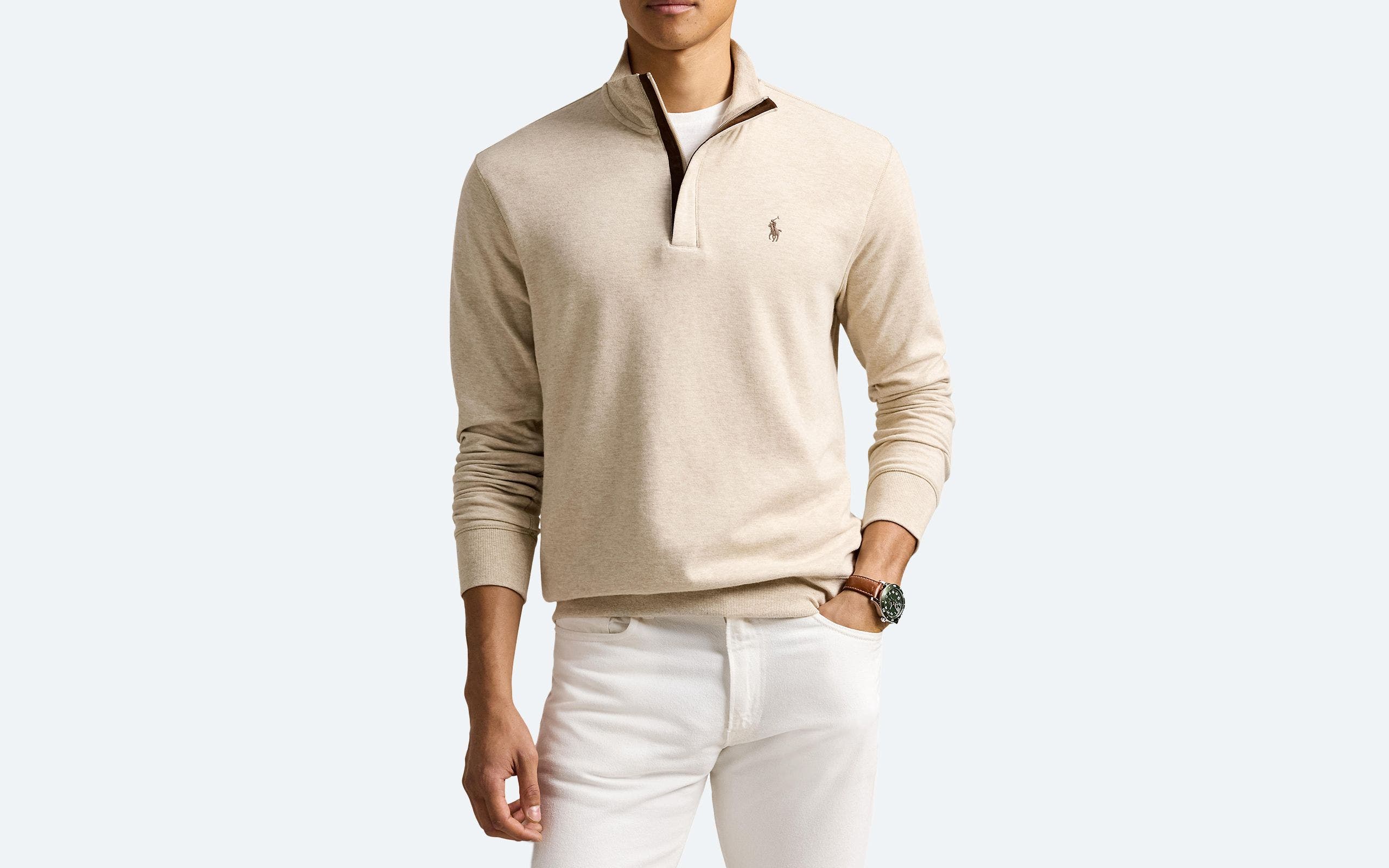 Man wearing a quarter-zip sweatshirt.