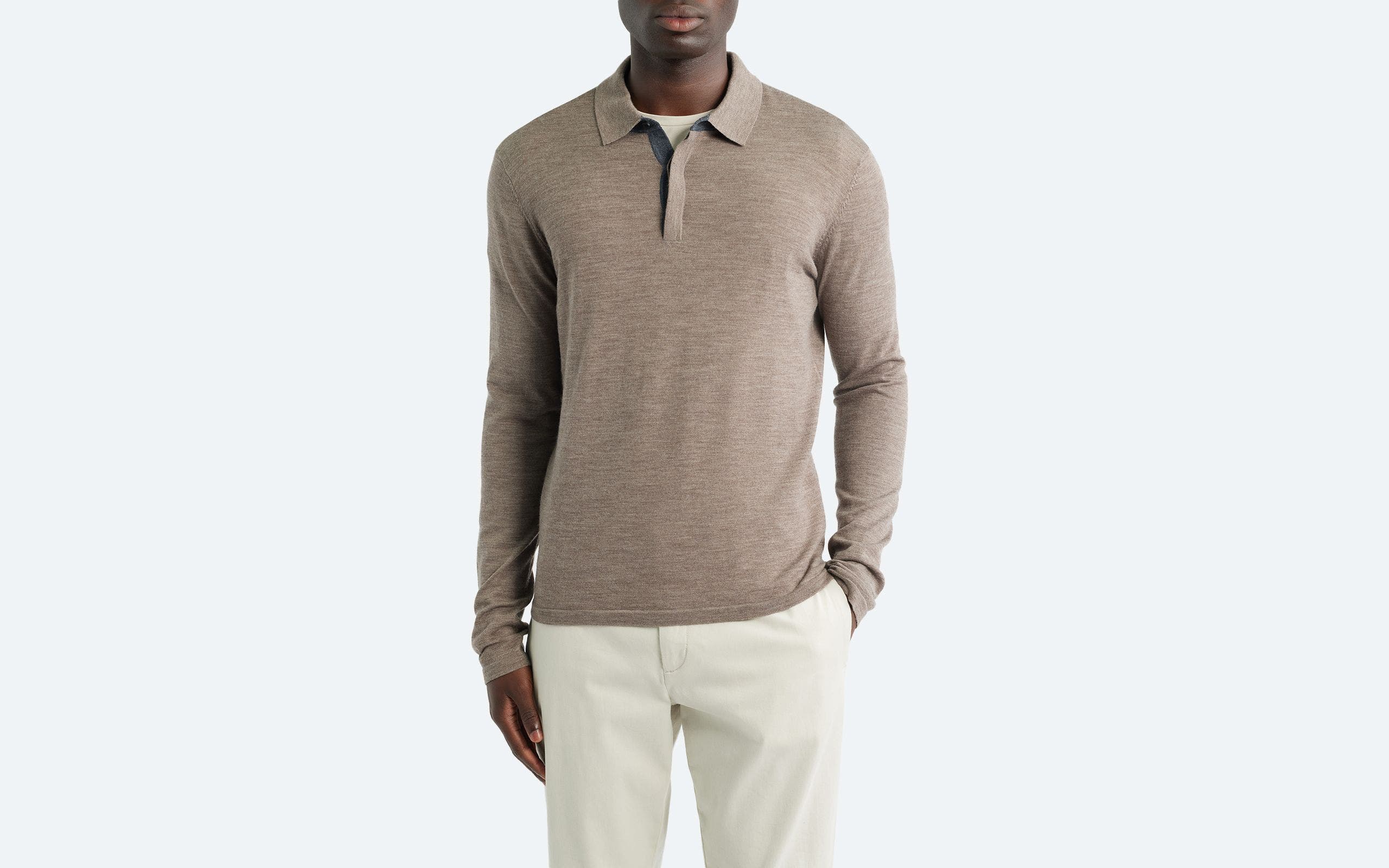 Man wearing a polo shirt.