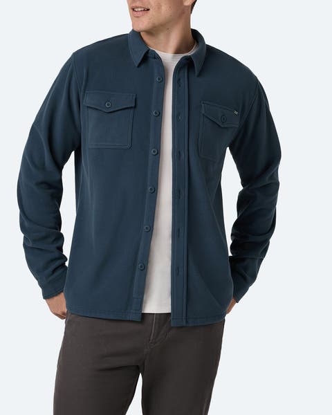 Man wearing a shirt jacket.