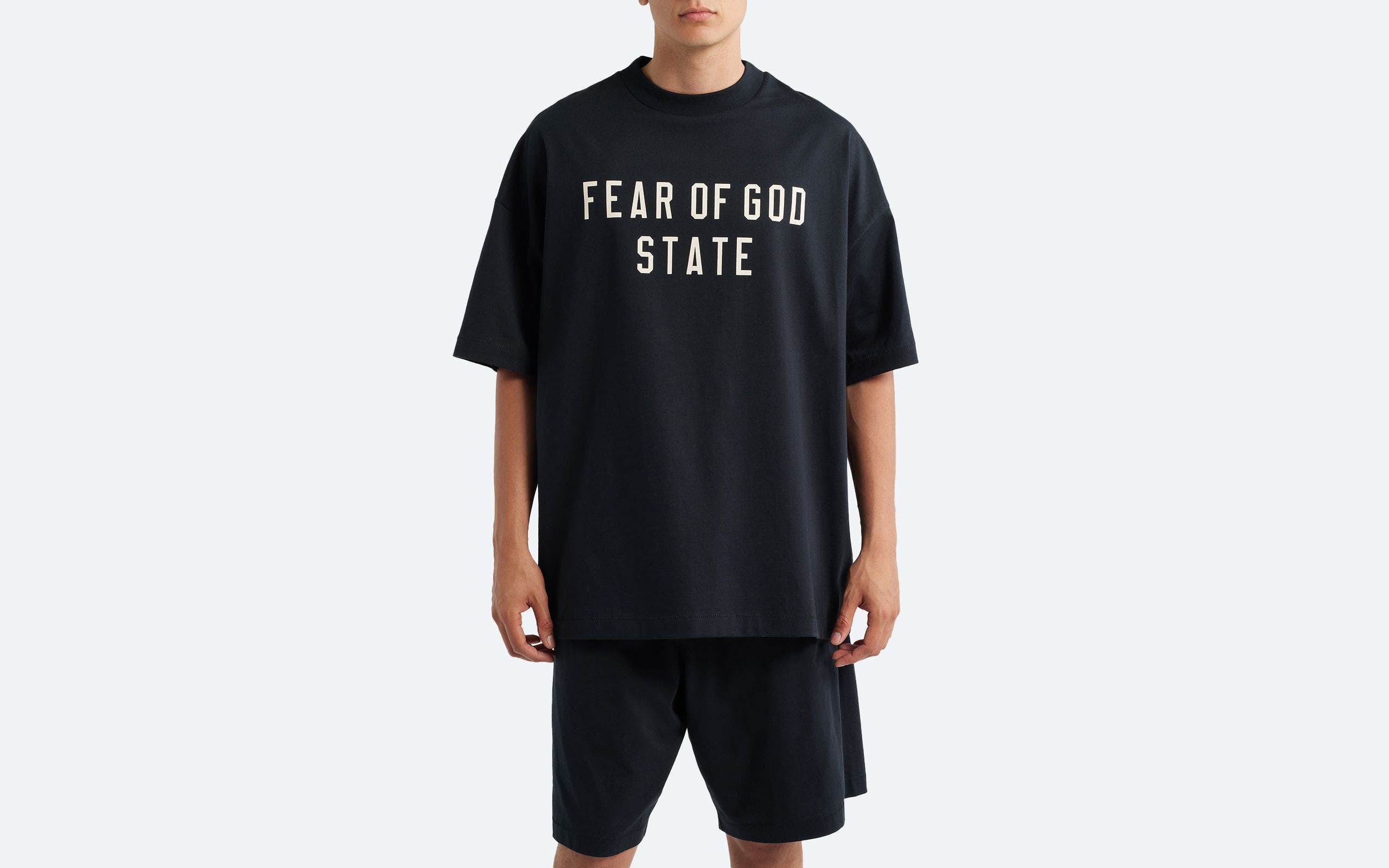 Man wearing a short-sleeve T-shirt.