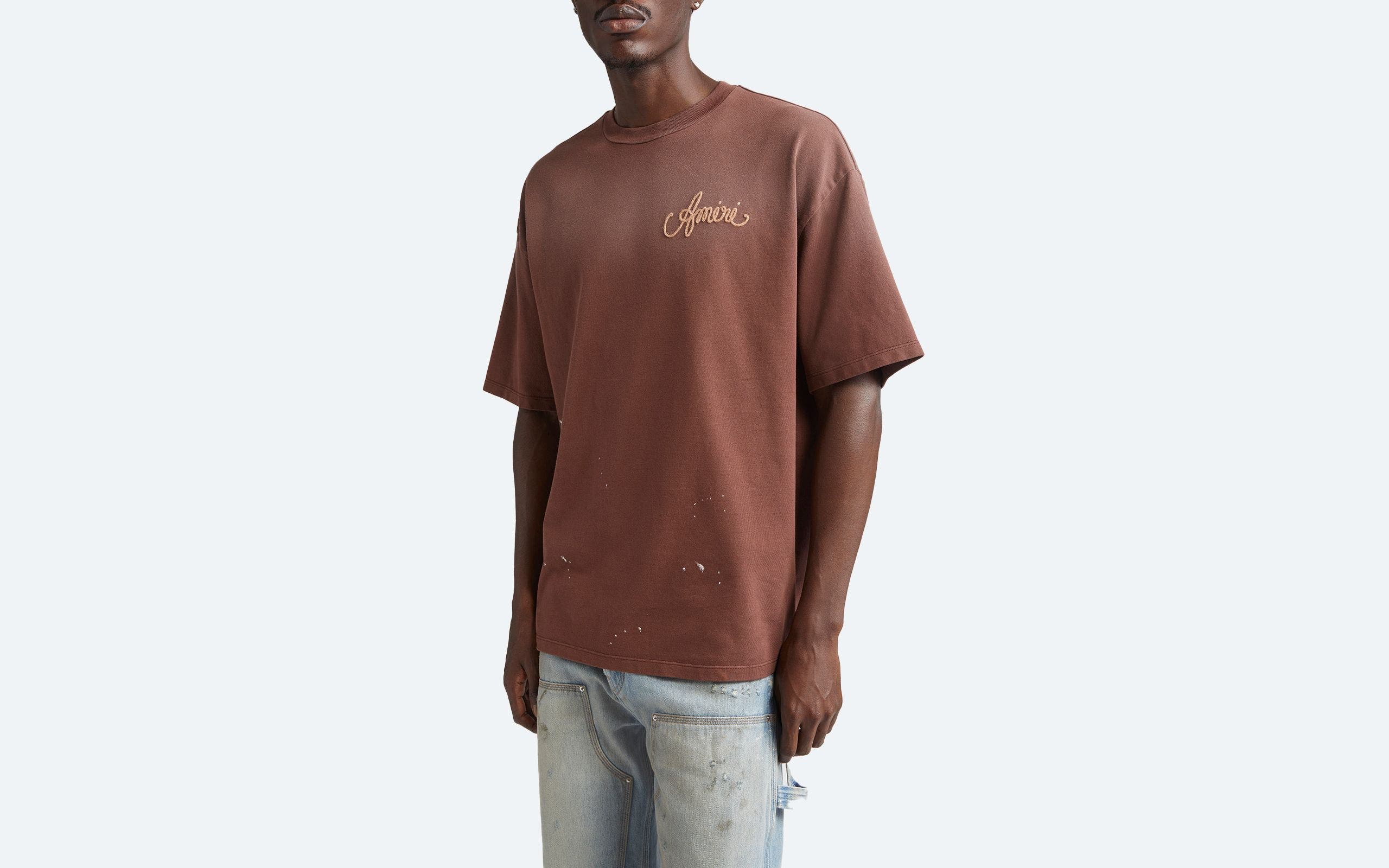 Man wearing a designer T-shirt.