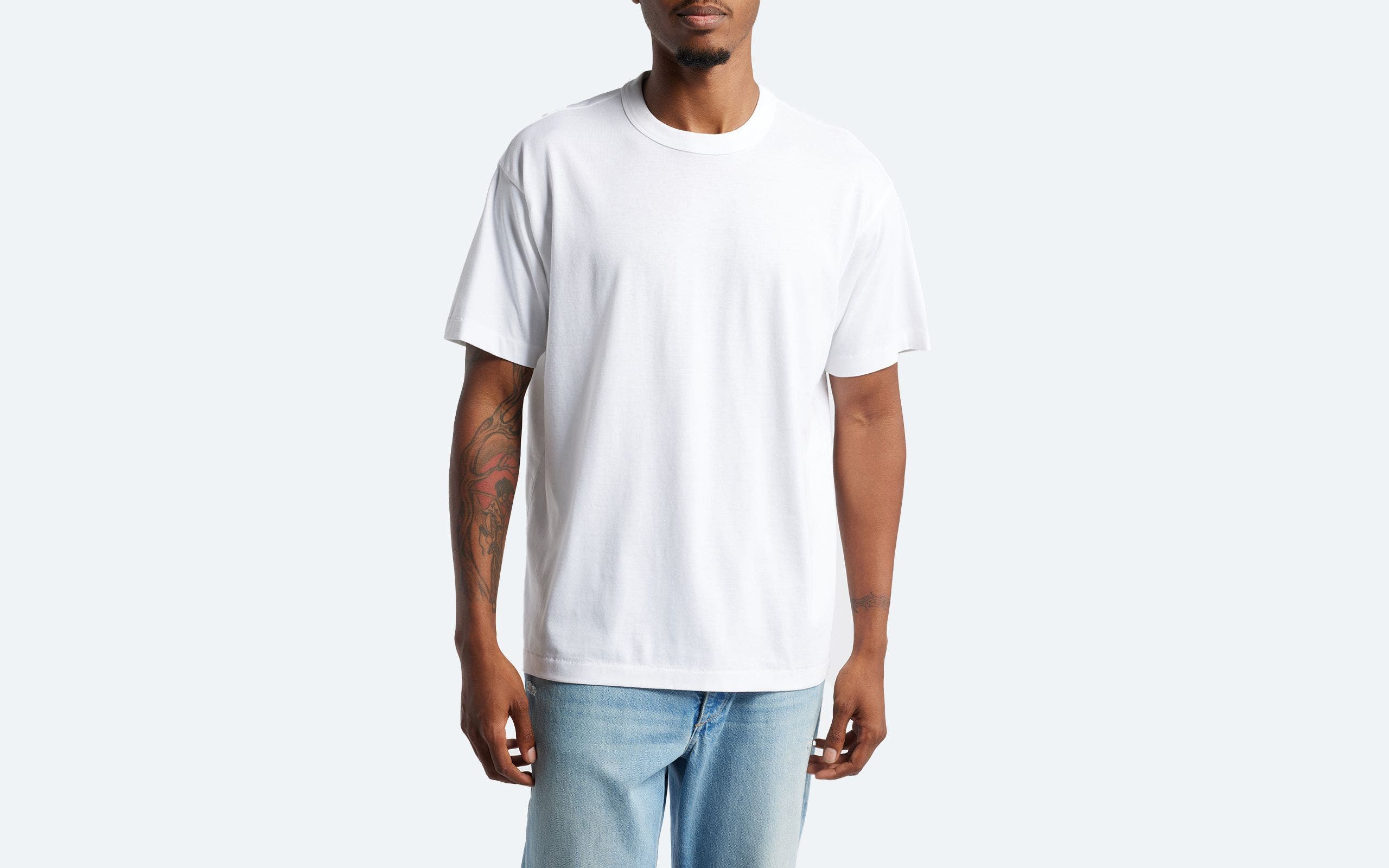 Man wearing a white T-shirt.