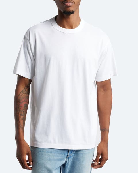 Man wearing a white T-shirt.