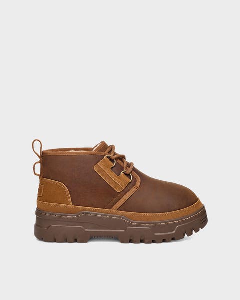 A brown lace-up boot.