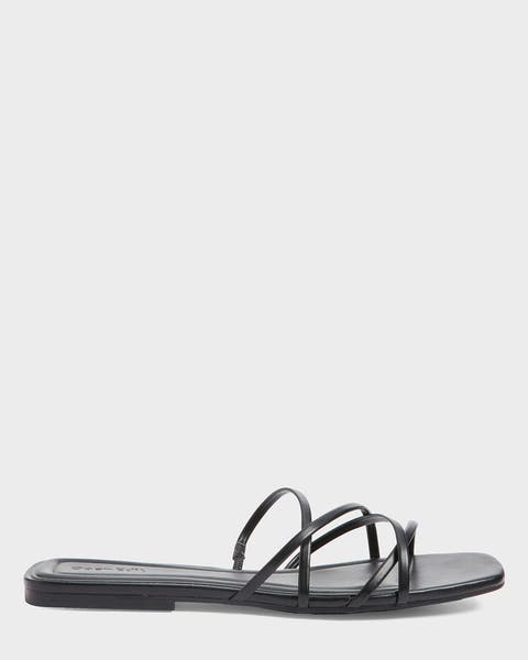 A strappy black sandal.