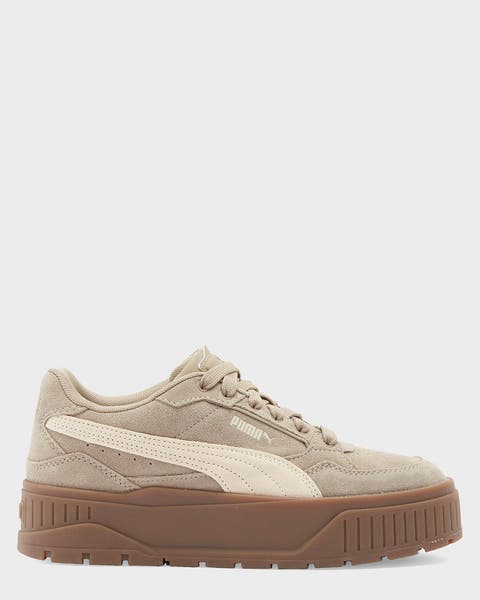 A tan adidas platform sneaker.